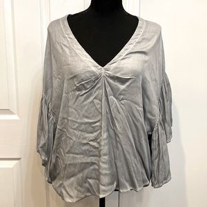 Beautiful grey blouse.